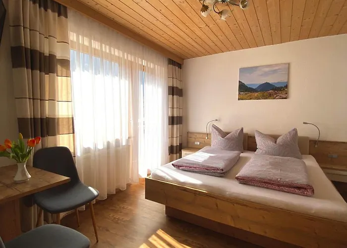 Апартаменты Gaestehaus Alpina Хиппах